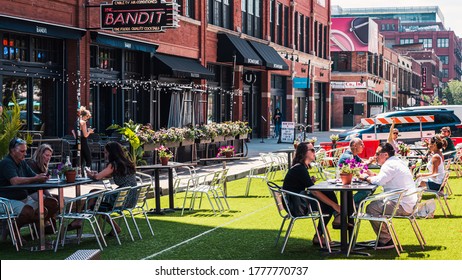 West Loop, Chicago-July 16, 2020: Outdoor dining helps restaurants comply with social distancing mandates.