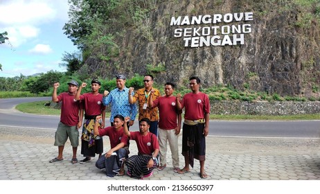 West Nusa Tenggara, Indonesia - March 17, 2022: A Government Official Poses With Residents At A Tourist Spot In Sekotong District, West Lombok Regency, NTB, Indonesia