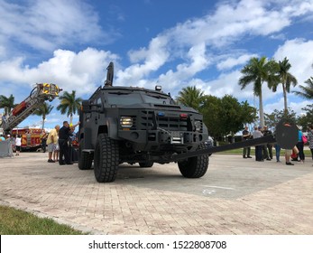 West Palm Beach, Florida - February 9 2019: Police armored truck on display during a parade on the beach boardwalk