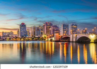 West Palm Beach, Florida, USA skyline on the Intracoastal Waterway at twilight.