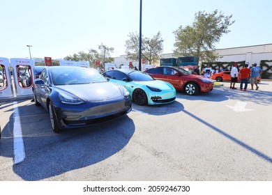 West Palm Beach Florida USA - Oct 17, 2021Car  Coffee Trunk Or Treat Halloween Spooktacular View Of A Line Of Teslas At Charging Stations 