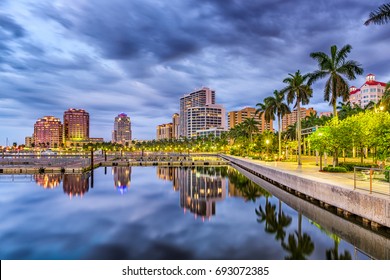 West Palm Beach, Florida, USA downtown skyline on the waterway.