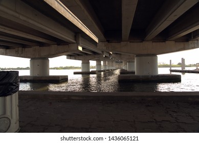 West Palm Beach, Florida/U.S.A-June 27 2019: Construction Of A New Bridge Using Cranes And Barges To Lay The Concrete Foundation On The Sea Bed. 