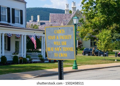 West Point, New York - August 30, 2019: Sign Seen On The Campus Of West Point Military Academy Directing Cadets To Cross The Road By Using The Beat Navy Tunnel