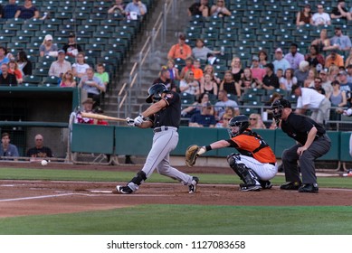 WEST SACRAMENTO, CA/U.S.A. - JUNE 29, 2018: Fresno Grizzlies Tim Federowicz Hits The Ball During A Game Against The River Cats At Raley Field.