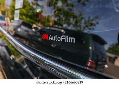 West Sumatra, Indonesia , June 12, 2022 : 3M Auto Film logo on car windshield. PT. 3M is the main authorized Dealer for 3M Indonesia Window Film for cars and buildings