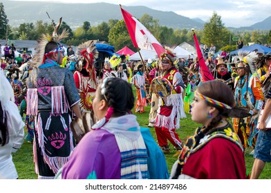 WEST VANCOUVER, BC, CANADA - AUGUST 30 : First Nations Take Part in Grand Entry of the Squamish Nation 27th Annual Pow Wow in West Vancouver, Canada on August 30 2014