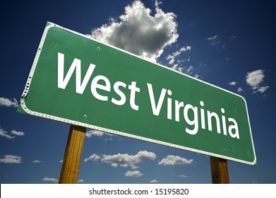 West Virginia Road Sign With Dramatic Clouds And Sky.