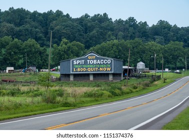 WEST VIRGINIA, USA - 6 AUGUST 2018: Quit Spit Tobacco Message On Side Of Barn In Rural West Virginia