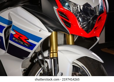  Westerlo, Antwerp Belgium - Sept 5 2022: Close Up Photo Of Front Suspension With Main Light And Logo Of Special Edition Suzuki GSX-R 1100 Motorbike. Special Edition Tricolor Livery Of This Race Bike.