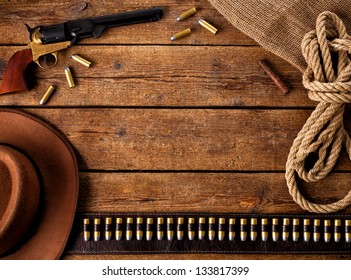 Western accessories on wooden table