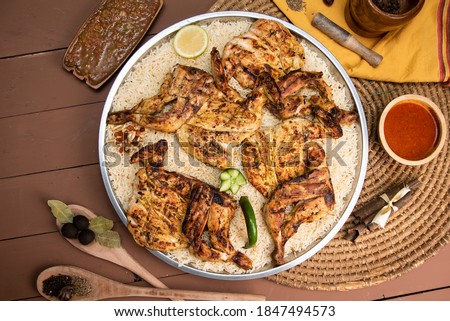 western arabic food , yemeni food. chicken with rice.