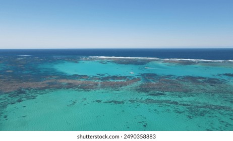 Western Australia shown during a road trip through drone footage with a DJI Mavic Air 2. The aerial image depicts the beauty of the sea dessert coast in Ningaloo Reef between Exmouth and Coral Bay.