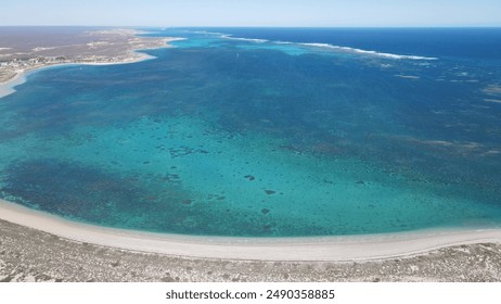 Western Australia shown during a road trip through drone footage with a DJI Mavic Air 2. The aerial image depicts the beauty of the sea dessert coast in Ningaloo Reef between Exmouth and Coral Bay.