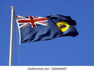 The Western Australian Flag Against A Blue Sky