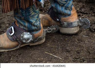 Western cowboy boots and silver spurs