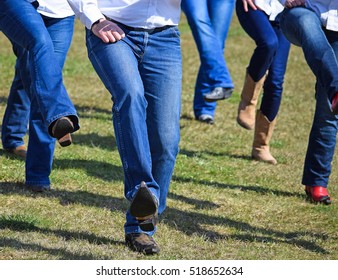 Western dancers show outdoors