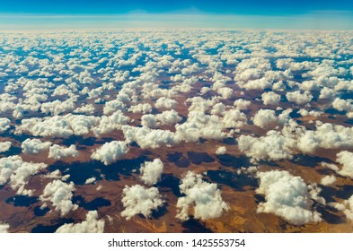 WESTERN QUEENSLAND, AUSTRALIA: Cumulus clouds over arid western Queensland rangelands suggest fairweather cloud formation unlikely to lead to precipitation despite rainfall needed in drought. 