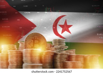 Western Sahara flag and big amount of golden bitcoin coins and trading platform chart. Crypto currency concept