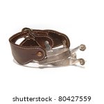 Western silver spurs on white