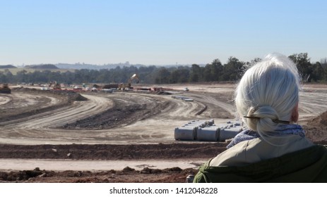 Western Sydney International Airport Construction Site, Badgerys Creek, New South Wales, Australia On 31 May 2019 - Woman With White Hair Sightseer. 