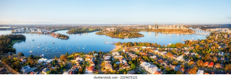 Western  Sydney in wide aerial panoram along Parramatta river from Inner city to Ryde and Parramatta suburbs.