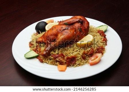 western traditional Arabic food , Yemeni food. chicken with rice. Mandi isolated selective focus 