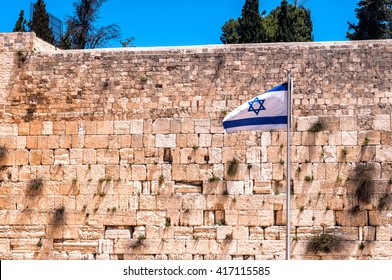 The Western Wall In Jerusalem With State Flag Of Israel.