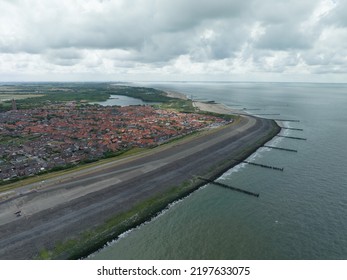 Westkapelle Province Of Zeeland Seawall And Shoreline Urban City Aerial View. Small Former Fishing Village Along The North Sea Touristic Destination In The Netherlands. Overhead Panorama