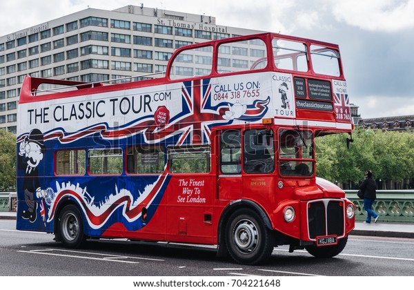 WESTMINSTER\
LONDON ENGLAND(UK),April 26 : The classic tour bus ( old english\
bus ) is parking on the westminster bridge\
.