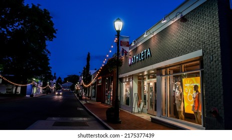 WESTPORT, CT, USA - JULY 3, 2022: Empty Street In Downtown With Storefronts At Sunday Evening Before 4th July