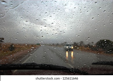 Wet Car Window On Highway