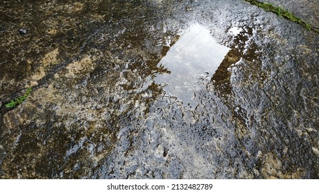 Wet Cement Floor After Rain.