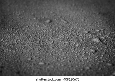 Wet Concrete Background With Selective Focus.
