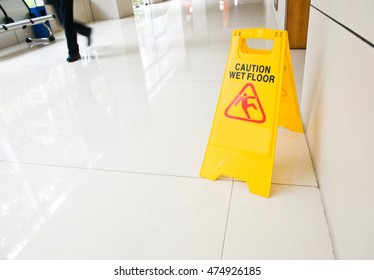 Wet Floor Caution Sign On Floor 