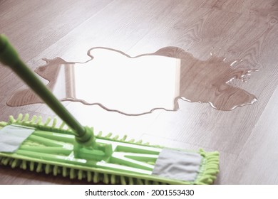 Wet Floor And Mop Wiping Water, Closeup