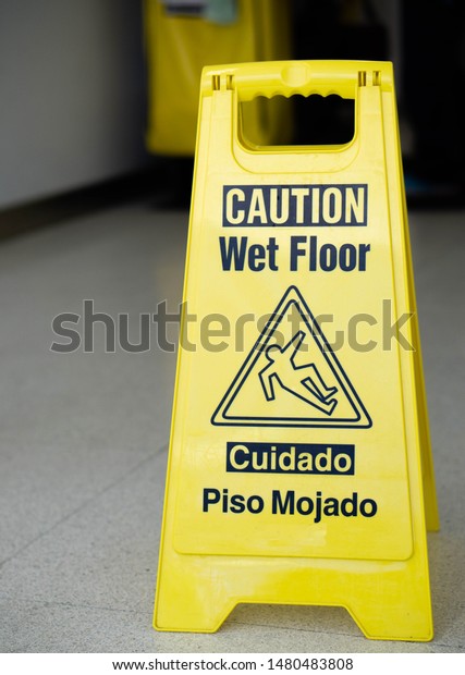 Wet Floor Sign English Spanish Stock Photo Edit Now 1480483808