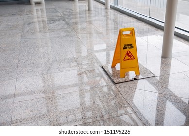 Wet Floor Sign On Lobby Floor