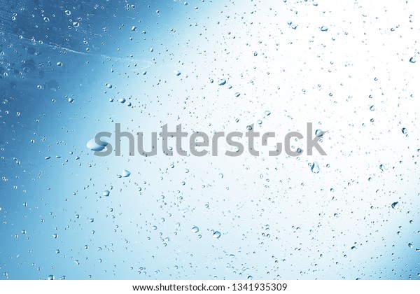wet glass background condensate /\
abstract rain, drops texture on transparent\
glass