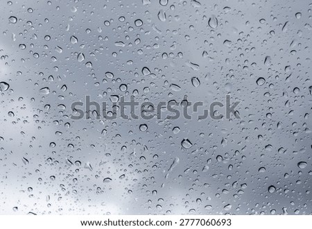Wet glass surface during the rain. 