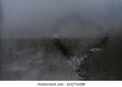 Wet Glass Texture. Heart Drawn By A Finger On A Stele. Light Romantic Background