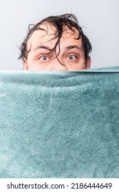 Wet Man Hiding Behind Towel