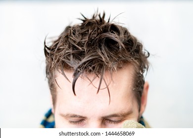 Wet Men Hair And Holding A Towel After Taking A Shower At Home