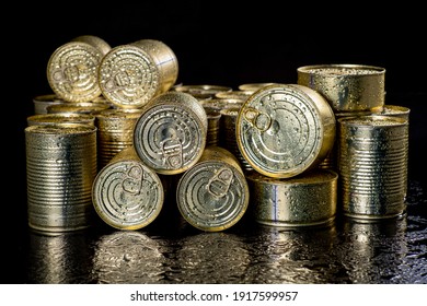 Wet Metal Food Cans With A Long Shelf Life. Water Drops On A Metal Surface. Dark Background.