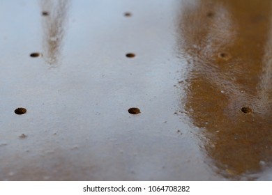 wet metal rusty surface close-up