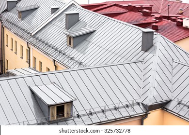 Wet New Metal Roofs Of Old Houses Viewed From Above