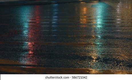 Wet old crosswalk in the night lighting - Powered by Shutterstock