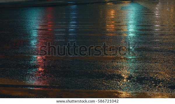 Wet old crosswalk in
the night lighting