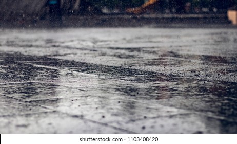 Wet Rainy Floor Ground On A Urban Cityscape