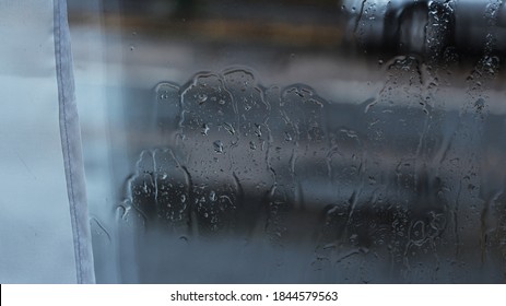 Wet Rainy Window Pane Covered In Water Droplets